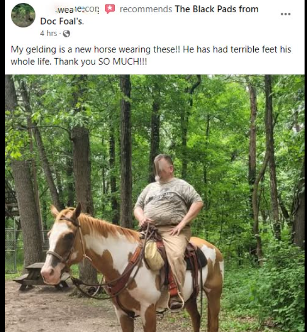 A man riding a horse with The Black Pads from Doc Foal's on his hooves.